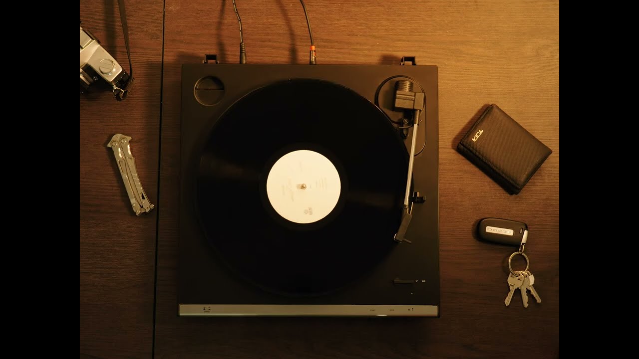 Record player still from Jordan's Ad Skit